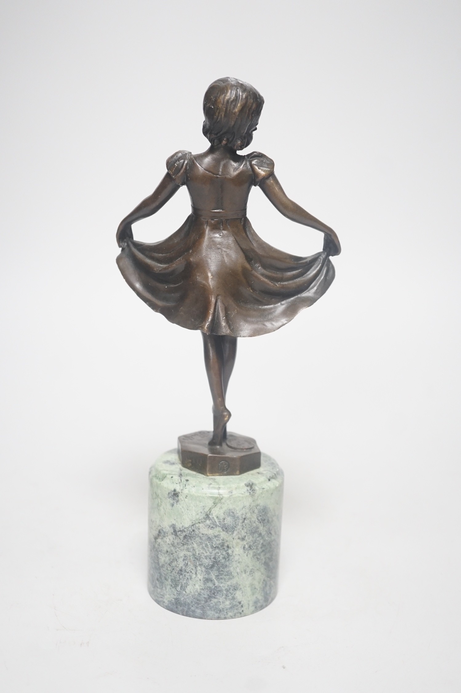 After Ferdinand Preiss (1882-1943), a bronze of a curtsying girl, on marble base, 27cm